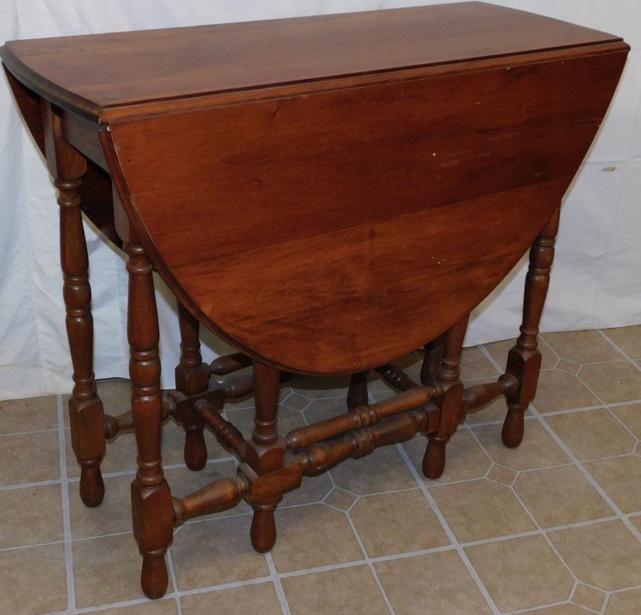 Mahogany Gate Leg Drop Leaf Table: Mahogany Gate Leg Drop Leaf Table. 34 1/2" W 14 1/2" D 30 1/2" H