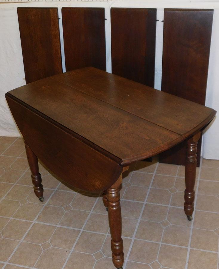 Antique Walnut Drop-leaf Table w/ 4 Leaves: Antique Walnut Drop-leaf Dining Table with 4 Leaves. 42" W 48 1/2" D 20" H, Leaves 11 3/4" W
