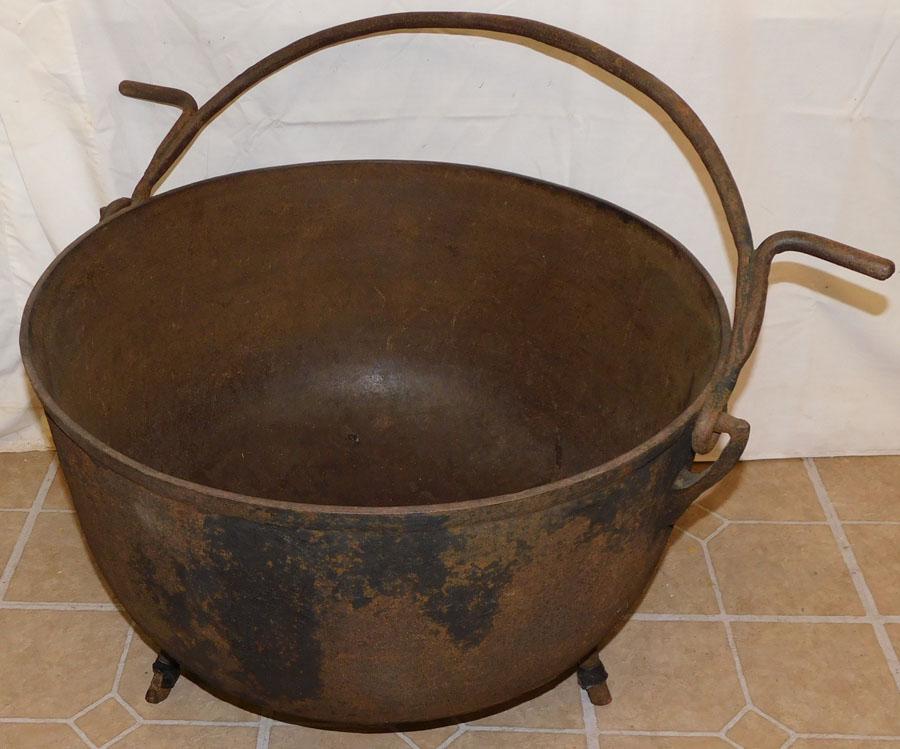 Antique Cast Iron Pot: Antique Cast Iron Pot. 31" DIA 14 3/4" H