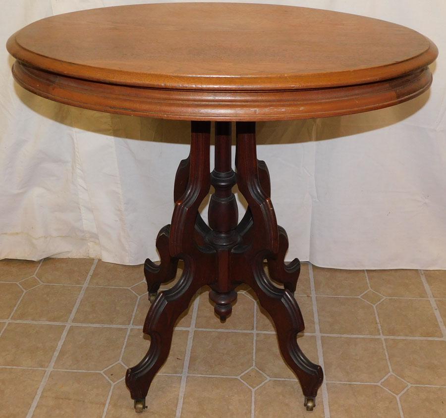 Walnut Victorian Oval Top Tea Table: Walnut Victorian Oval Top Tea Table. 29" W 22" D 28 1/2" H
