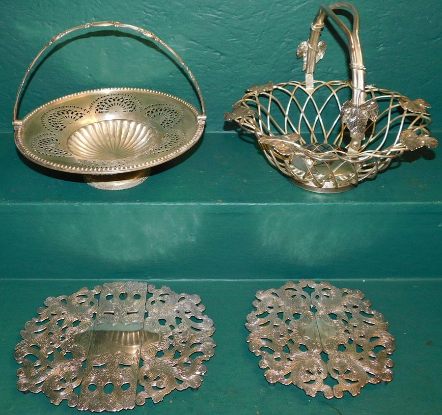 4 Piece Silverplate Lot, (2 Baskets & 2 Trivets): 4 Piece Silverplate Lot, (2 Baskets & 2 Trivets). Up to 12 1/2" DIA 10" H