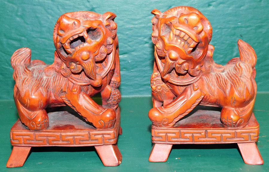Pair of Carved Wood Foo Dogs: Pair of Carved Wood Foo Dogs. 4" W 3" D 5" H