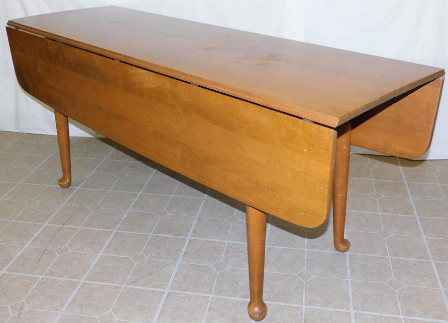 Cherry Drop-Leaf Dining Table by Ethan Allen: Cherry Drop-Leaf Dining Table by Ethan Allen. 66" W 43" D 29" H