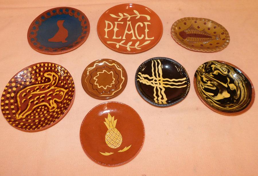 Lot of 8 Redware Plates & Bowls Signed: Lot of 8 Redware Plates & Bowls Signed. Up to 9 1/2" DIA.