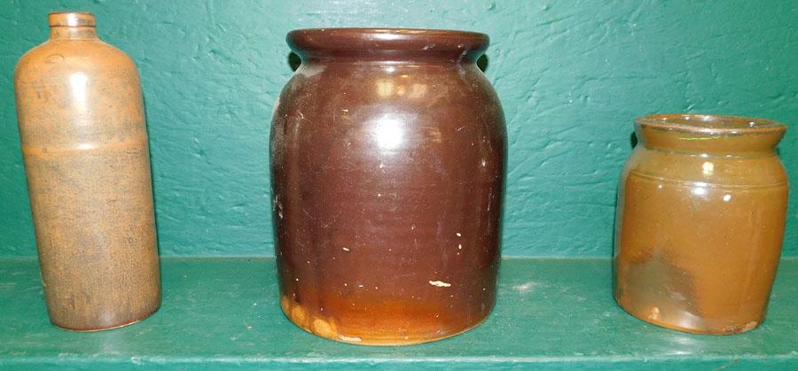 Two Stoneware Crocks and one Bottle: Two Stoneware Crocks and one Bottle. 9" H (Largest)