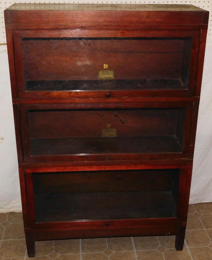 Walnut 4 Sectional Barrister Bookcase By Globe: Walnut 4 Sectional Barrister Bookcase By Globe. 34 1/2" W 11 3/4" D 51 3/4" H
