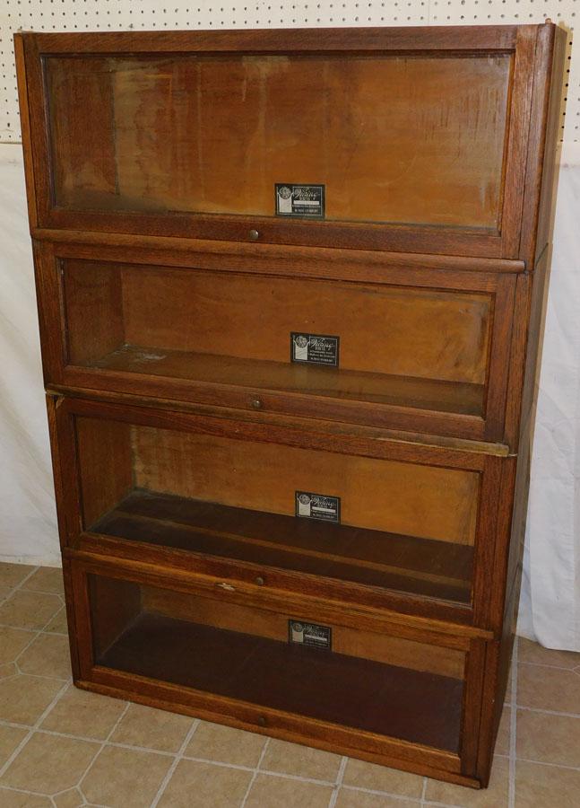 Four Sectional Oak Barrister Bookcase By Viking (No: Four Sectional Oak Barrister Bookcase By Viking (No Base & Top). 34 1/4" W 11 1/4" D 15 3/4" H
