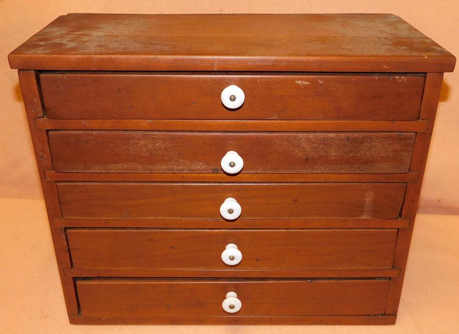 Primitive Walnut Spool Cabinet: Primitive Walnut Spool Cabinet. 17 3/4" W 8 1/2" D 14 1/2" H