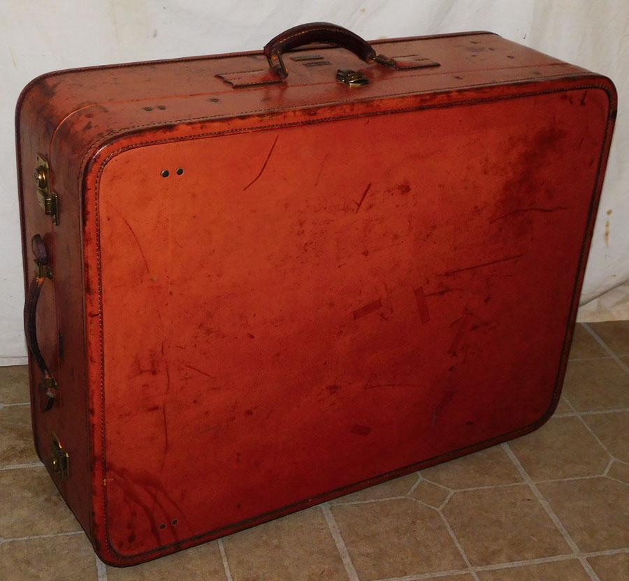 Genuine Cow Hide Cananaugh Suitcase: Genuine Cow Hide Cananaugh Suitcase . 30" W 9 1/2" D 24 1/2" H