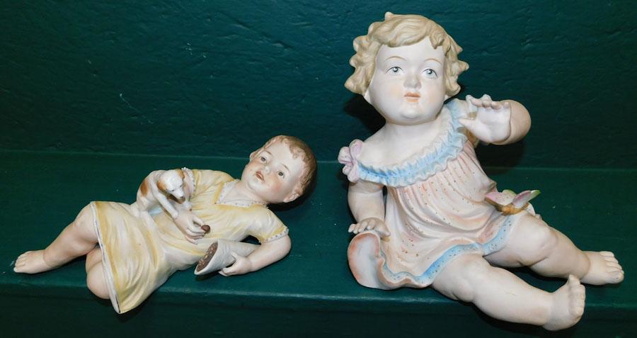 2 Porcelain Piano Babies: 2 Porcelain Piano Babies. 8 1/2" H