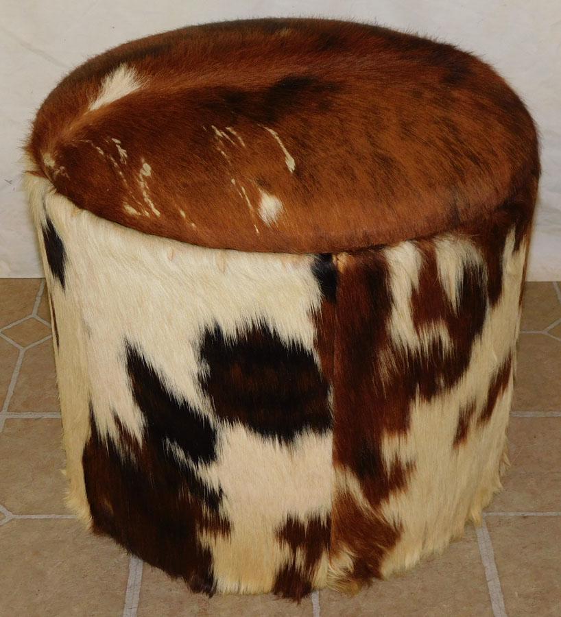 Lift Top Cow Hyde Ottoman (1 of 4)