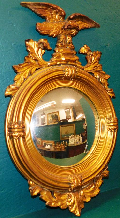 Gilt Frame Bull's Eye Mirror with Eagle Crest: Gilt Frame Bull's Eye Mirror with Eagle Crest. 18" X 29 1/4"
