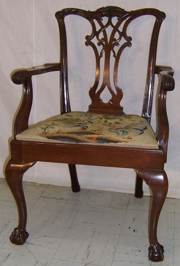 Ball and claw foot mahogany Chippendale arm chair 