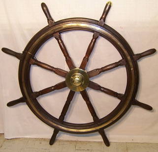 Early ships wheel with brass trim (55" round): Early ships wheel with brass trim (55" round)