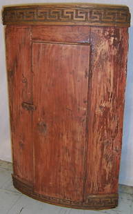 Early bow front hanging corner cupboard: Early bow front hanging corner cupboard with Roman Key molding (30 1/2" tall)