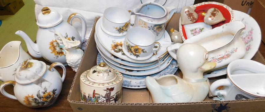 Lot of Porcelain Cups, Teapots, & Creamers: Lot of Porcelain Cups, Teapots, & Creamers.