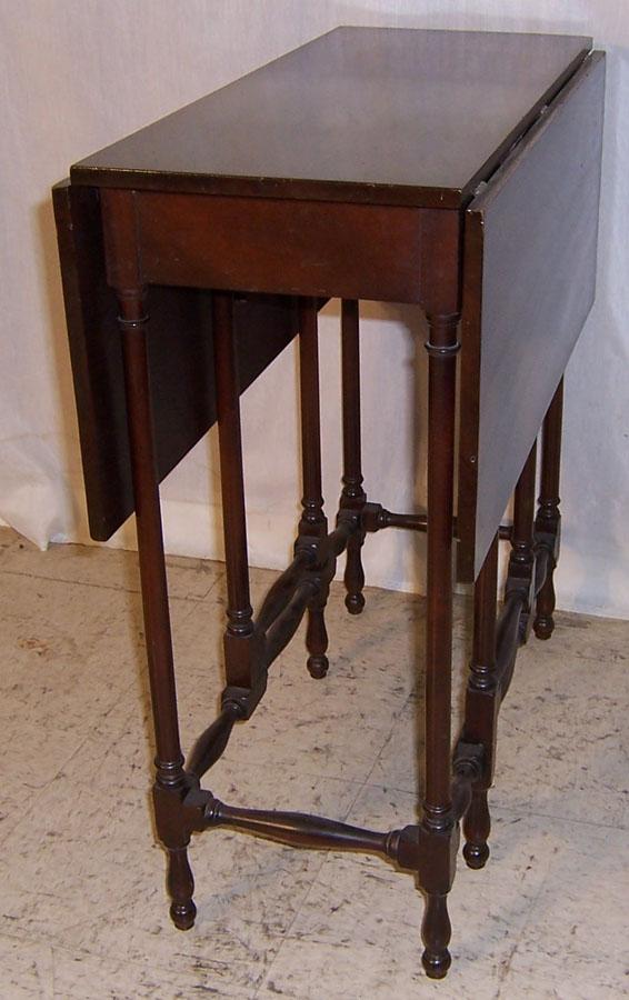 Mahogany spider leg drop leaf table: Mahogany spider leg drop leaf table, 26" long x 31 1/2 " open x 27" tall.