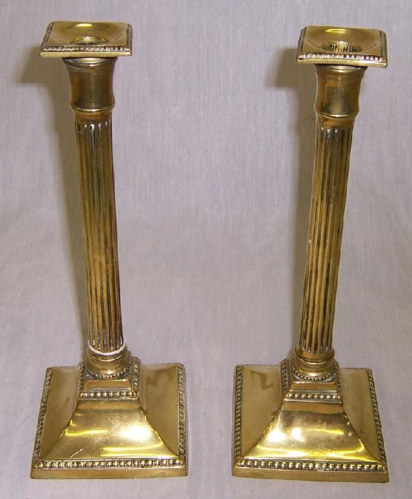 Pr of 19th century brass column form candlesticks: Pair of 19th century brass column form candlesticks. 11 1/2" tall.