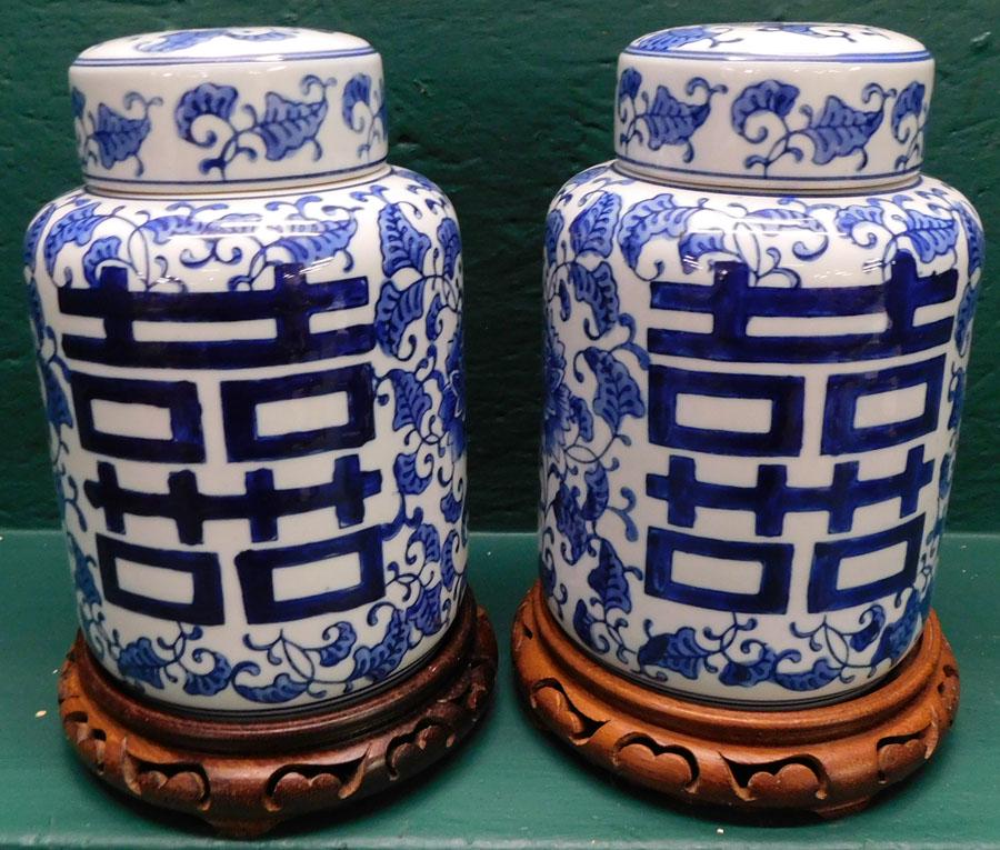 Pair of Oriental Covered Jars on Teakwood Stands (1 of 4)