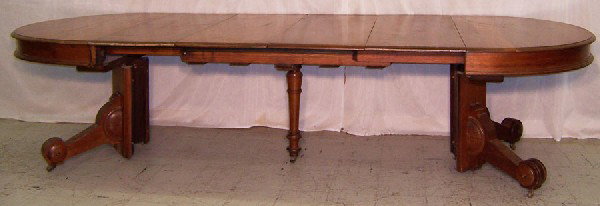 Walnut Victorian pedestal banquet table- 4 leaves: Walnut Victorian pedestal banquet table with 4 leaves. 10' long x 45" wide.