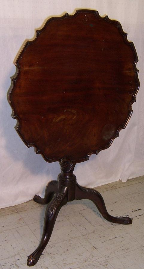 Pie crust claw foot mahog tilt, 1-board top table: Pie crust claw foot mahogany tilt top 1 board top table. Circa 18th century. with the grain 28 " across, against the grain, 28 5/8" across.