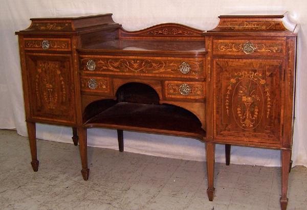 Marquetry inlaid Hepplewhite Edwardian side board: Marquetry inlaid Hepplewhite Edwardian side board with cellaret drawer. 71 1/2" wide x 25" deep x 45" tall.