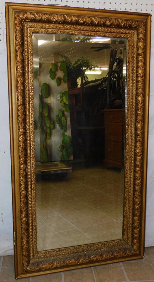 Antique Gilt Framed Beveled Mirror: Antique Gilt Framed Beveled Mirror. 26 1/4" X 48 1/2"