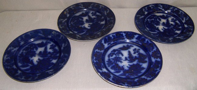4 early flow blue ironstone plates.: 4 early flow blue ironstone plates.