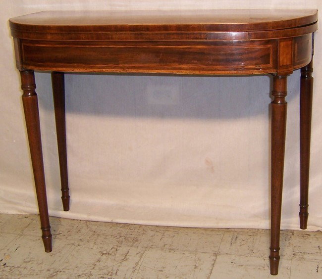 Period mahogany Hepplewhite fold over game table.: Period mahogany Hepplewhite fold over game table.