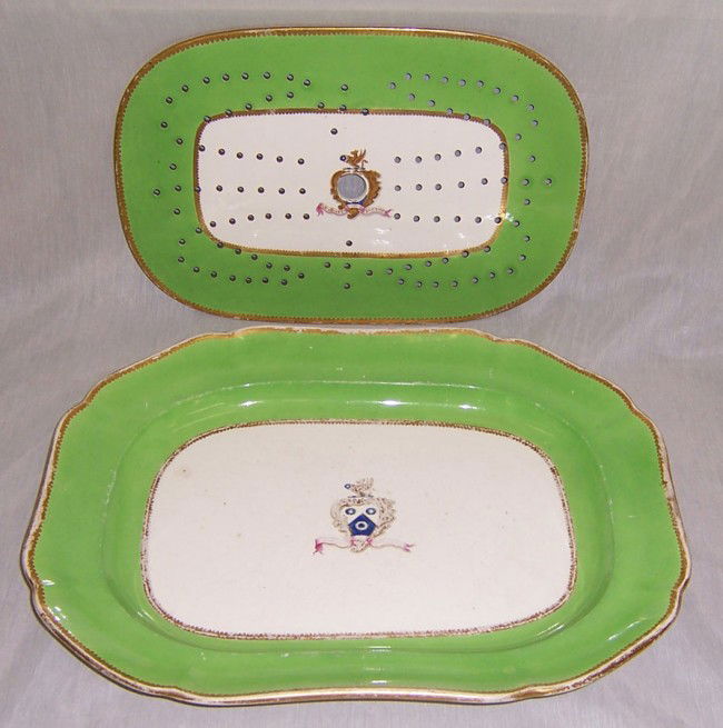 Early Spode platter and matching strainer: Early Spode platter and matching strainer with armorial coat of arms. 12 1/2" x 17".