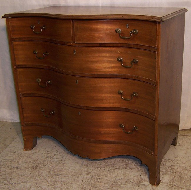 Mahog serpentine front Hepplewhite 4 drawer chest: Mahogany serpentine front Hepplewhite 4 drawer chest with original feet and swan handled pulls.41 1/2" x 21 1/2" x 39".