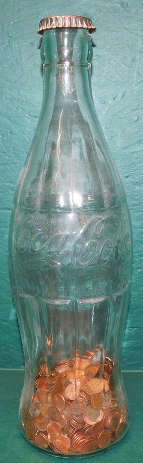 Large Glass Coca Cola Bottle Bank W/ Change (1 of 3)