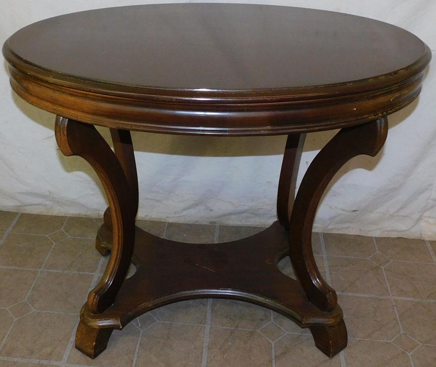 Mahogany Oval Top Center Table: Mahogany Oval Top Center Table. 32" W 22 1/2" D 25 3/4" H
