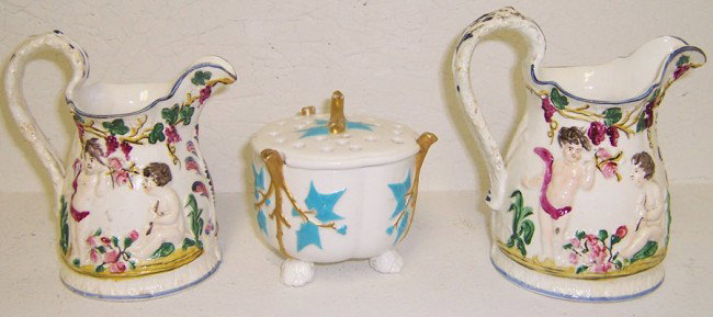 2 Capodimonte style pitchers & footed vase: (2) Capodimonte style pitchers and footed floral vase.