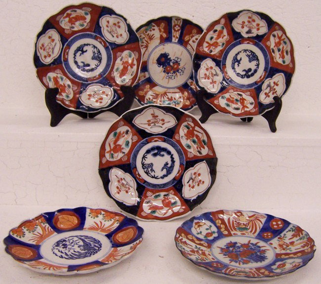 (6) misc. turn of the century Imari plates.: (6) miscellaneous turn of the century Imari plates. Some rib chipping.