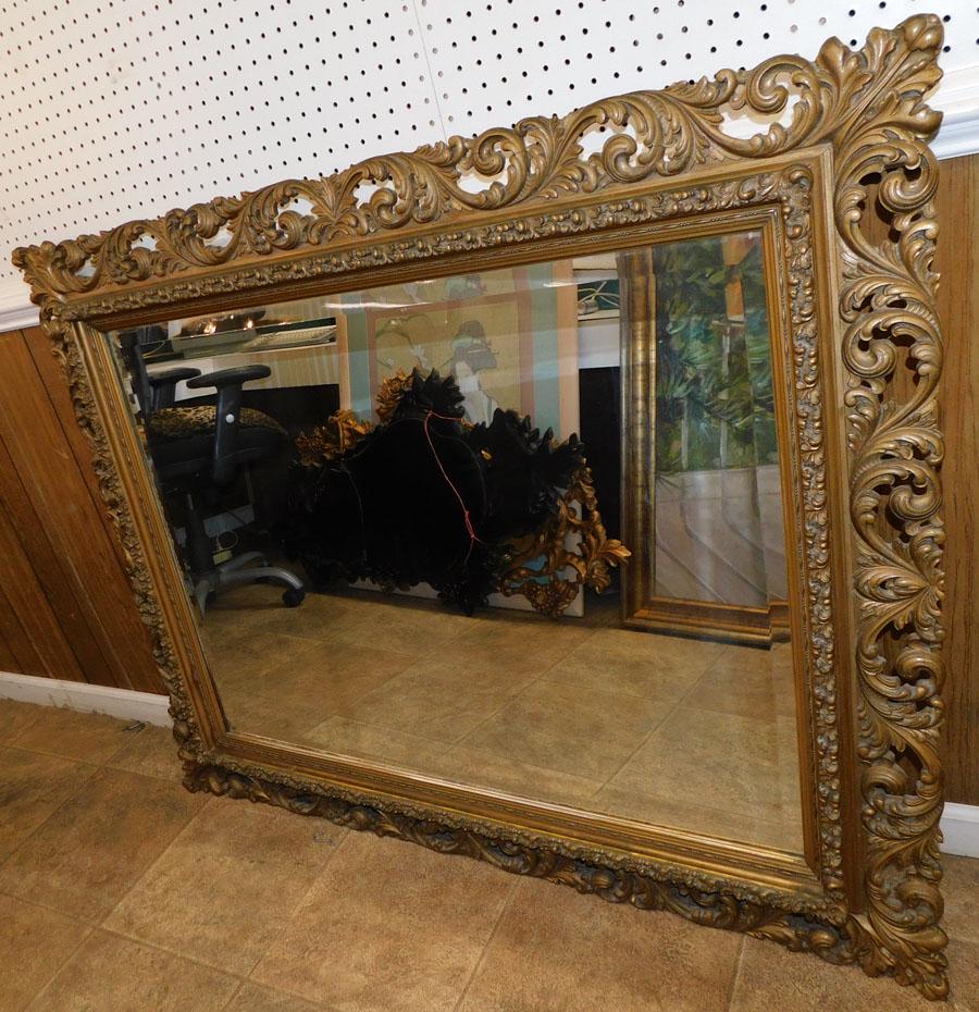 Antique Ornated Gilt Frame Beveled Mirror: Antique Ornated Gilt Frame Beveled Mirror. 51 3/4" X 41 3/4"