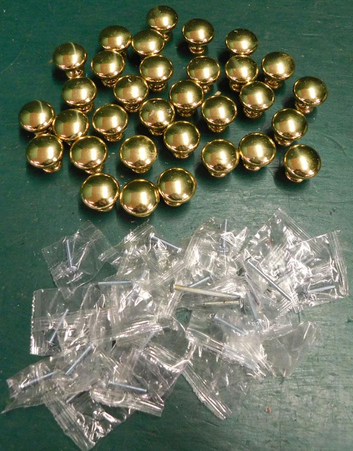 Lot of Cast Brass Knobs: Lot of Cast Brass Knobs.