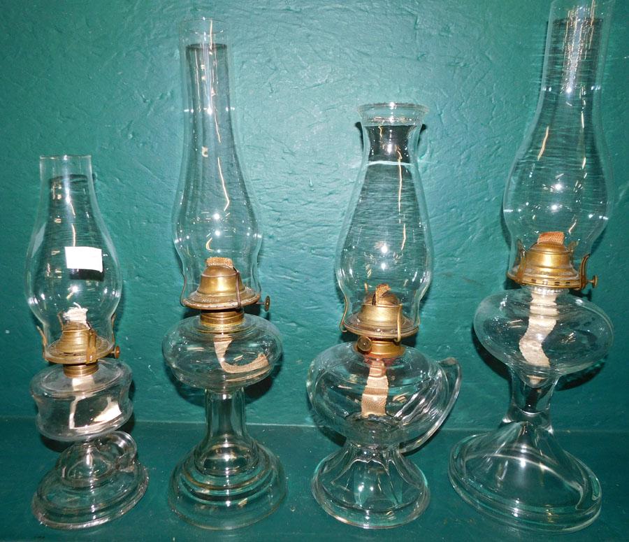 Lot 4 Glass Oil Lamps: Lot 4 Glass Oil Lamps. 19" H