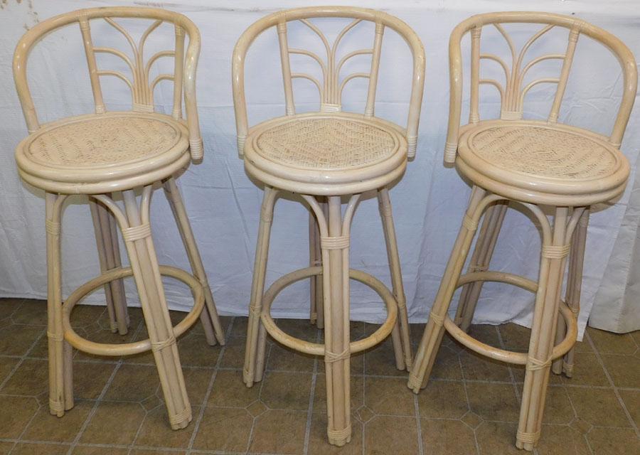 Three Swivel Rattan Bar Stools (1 of 2)