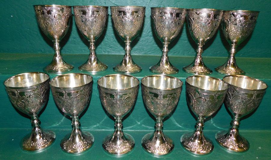 12 Pc Repousse Silver On Copper Goblets: 12 Pc Repousse Silver On Copper Goblets. 6 1/4" H