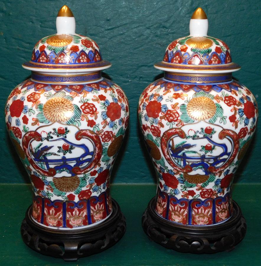 Pair Oriental Porcelain Covered Urns On Teakwood Stands (1 of 5)