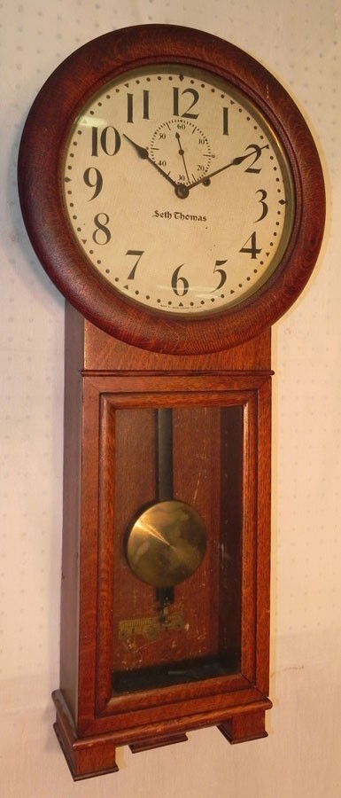 Seth Thomas oak regulator wall clock. 36" tall: Seth Thomas oak regulator wall clock. 36" tall