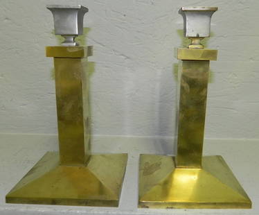 Pr signed Bradley and Hubbard candlesticks.: Pair of signed Bradley and Hubbard metal candlesticks.