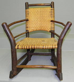 Child's hickory rush seat chair.: Child's hickory rush seat chair. 21 1/2" tall x 19" wide.