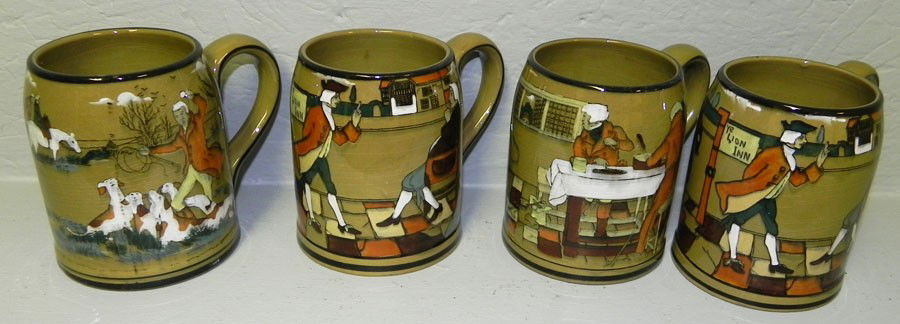 (4) mugs by Buffalo Pottery.: (4) mugs by Buffalo Pottery.