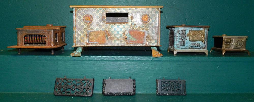 4 Metal Child's Stoves: 4 Metal Child's Stoves. Up to 14" x 9 3/4" x 7 3/4"