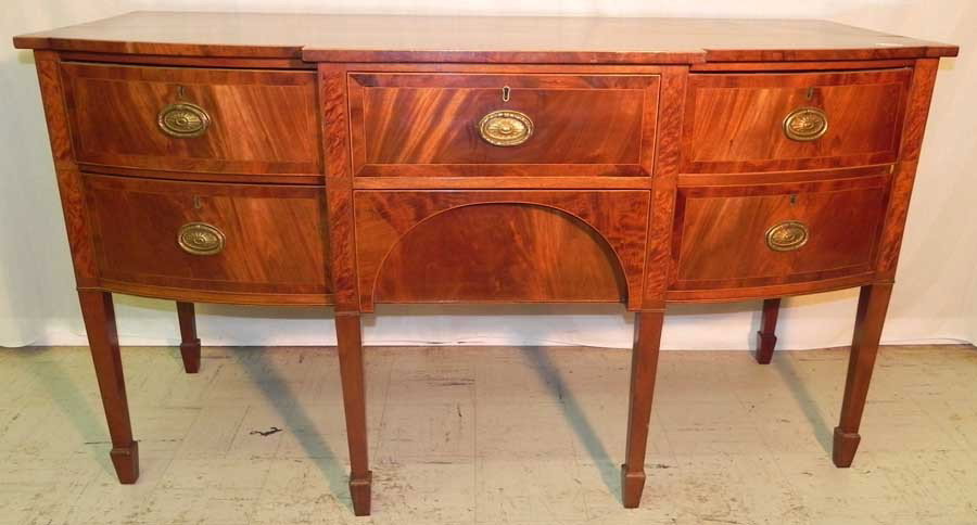 Inlaid mahogany bow front side board.