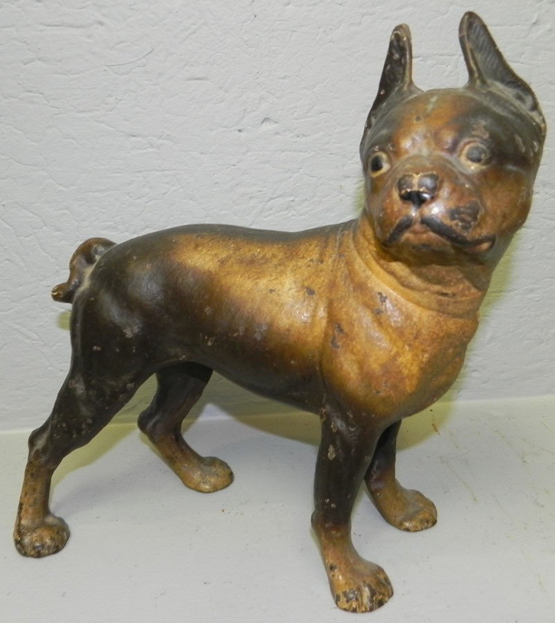 Early cast iron door stop of boxer dog.: Early cast iron door stop of boxer dog. 10 1/4" tall x 9" long.