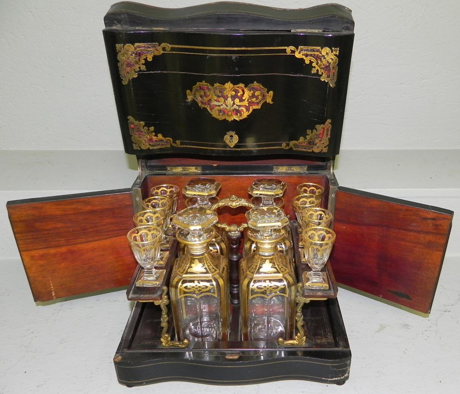French dore' bronze Tantalus set: French dore' bronze Tantalus set with bottles and liqueur glasses. 1 decanter is as is.