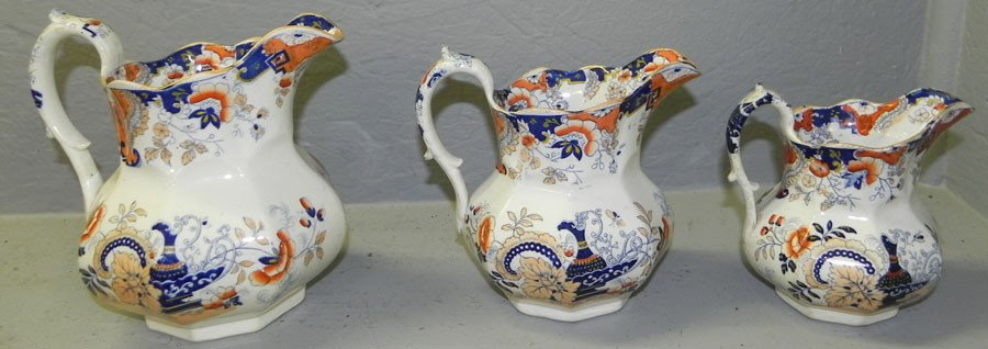 Set of (3 ) ironstone decorated pitchers- Nanking: Set of (3 ) ironstone decorated pitchers in Nanking pattern.